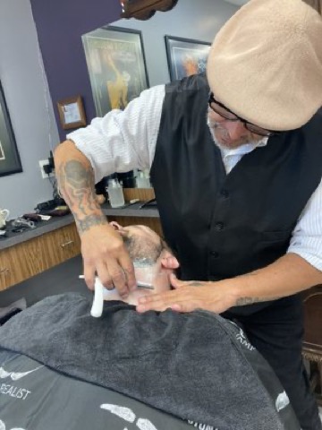 Straight razor hot towel shave, close up